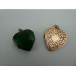 A part 9ct yellow gold florally engraved locket of heart shaped form, l. 4.