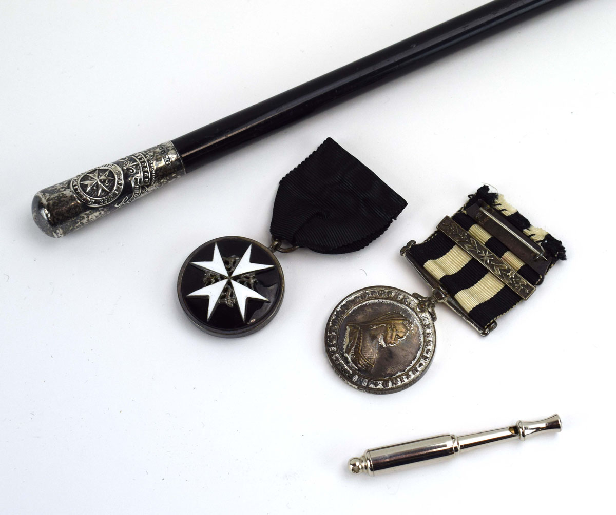 St John's Ambulance Brigade: a silver-mounted swagger stick, a Victorian medal,