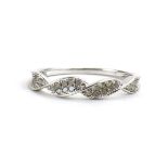 A 9ct white gold ring set small diamonds in a twist setting by Jacques Christie, ring size S, 2.