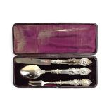 A late Victorian silver three piece Christening set comprising knife, fork and spoon,