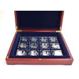 A cased set of twelve London Mint silver proof coins commemorating the Kings and Queens of Great