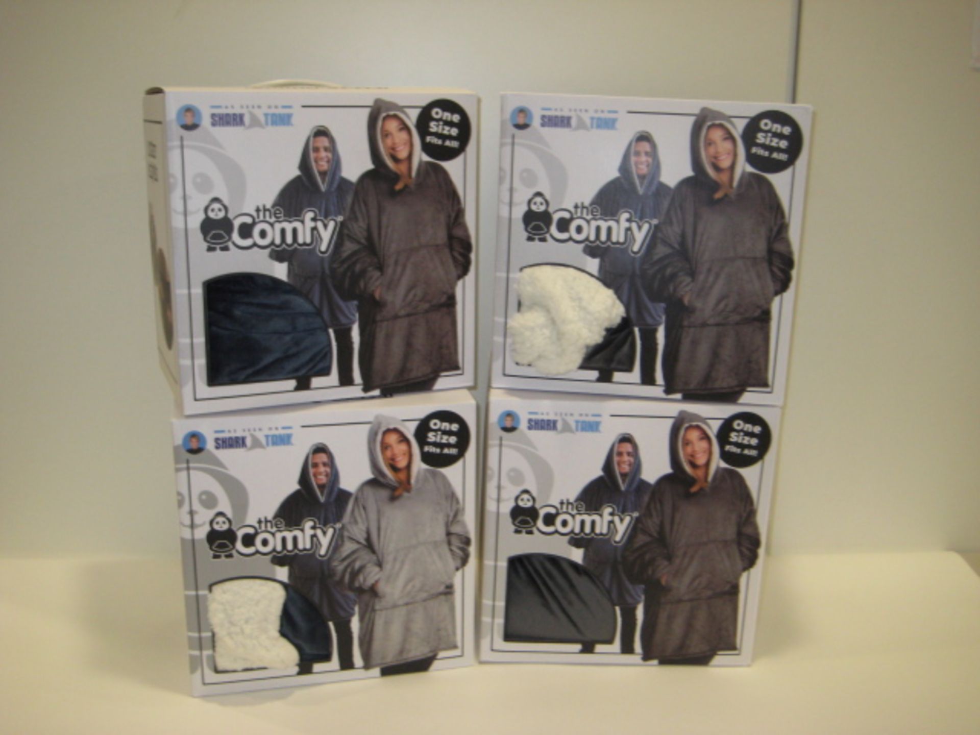 4 boxed The Comfy shark tank hooded fleeces