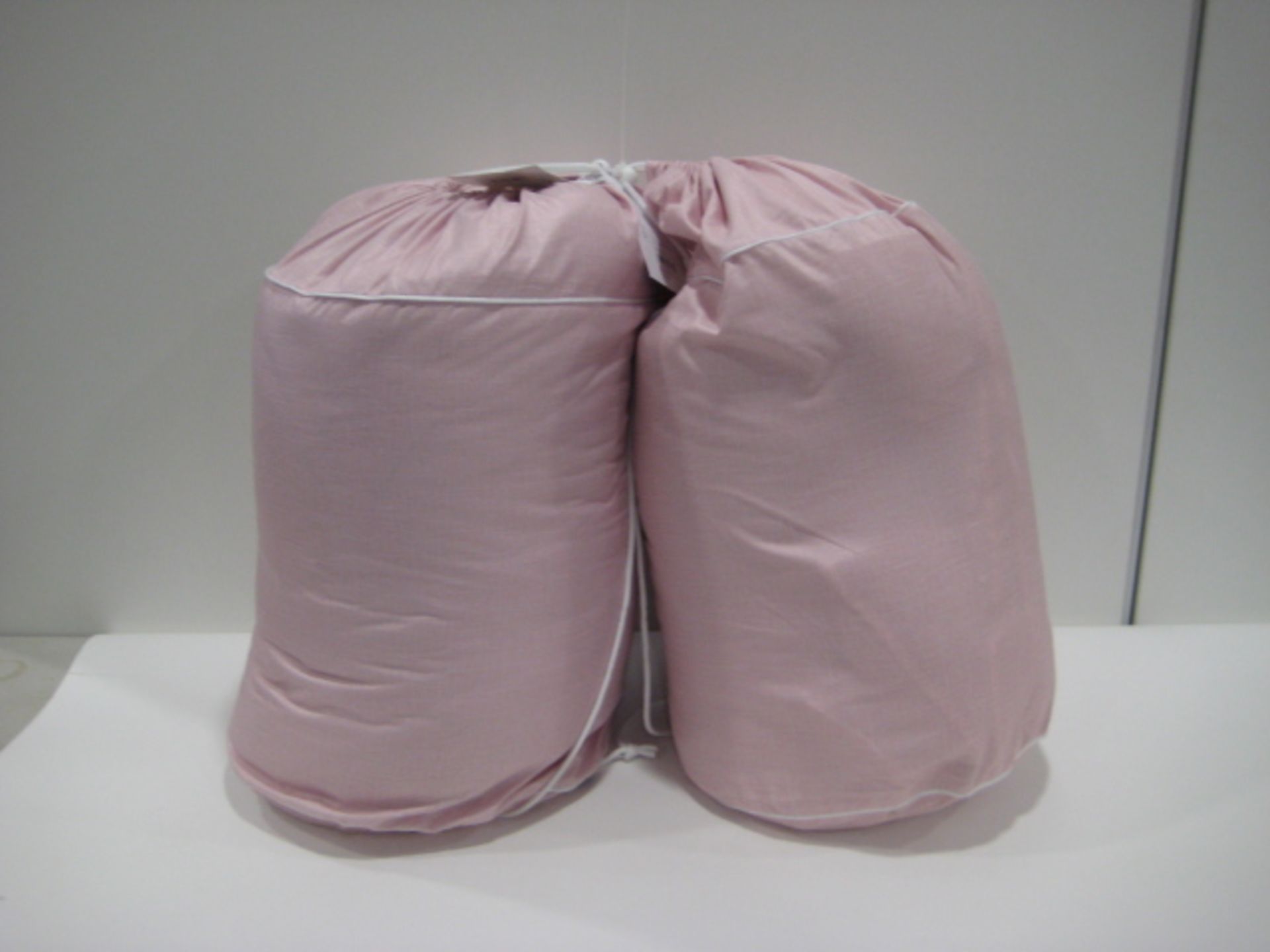 2 bagged Night Owl double duvets in pink