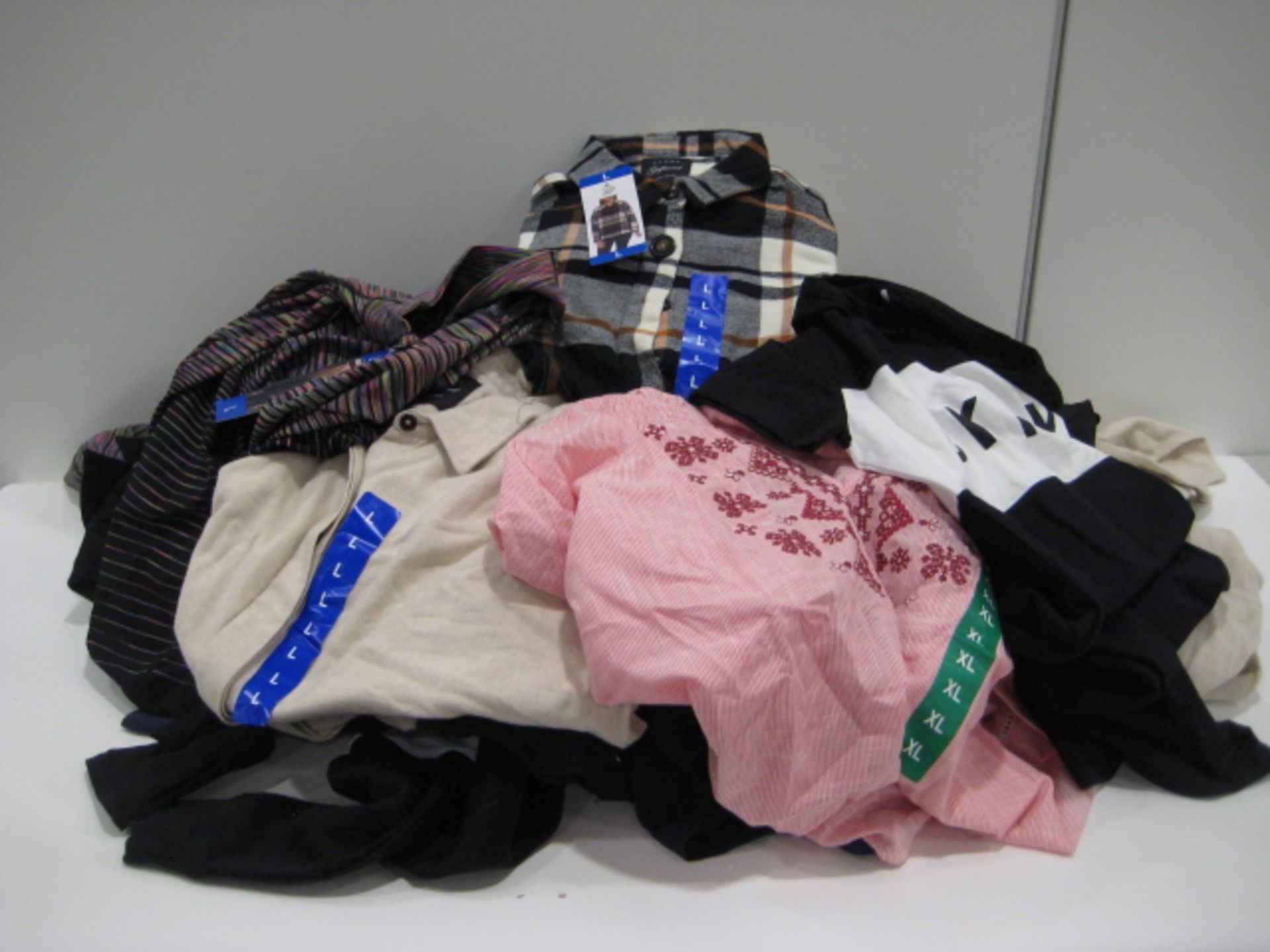 Bag of ladies tops by Jachs of New York, Kirkland, DKNY and Vintage America in various sizes,