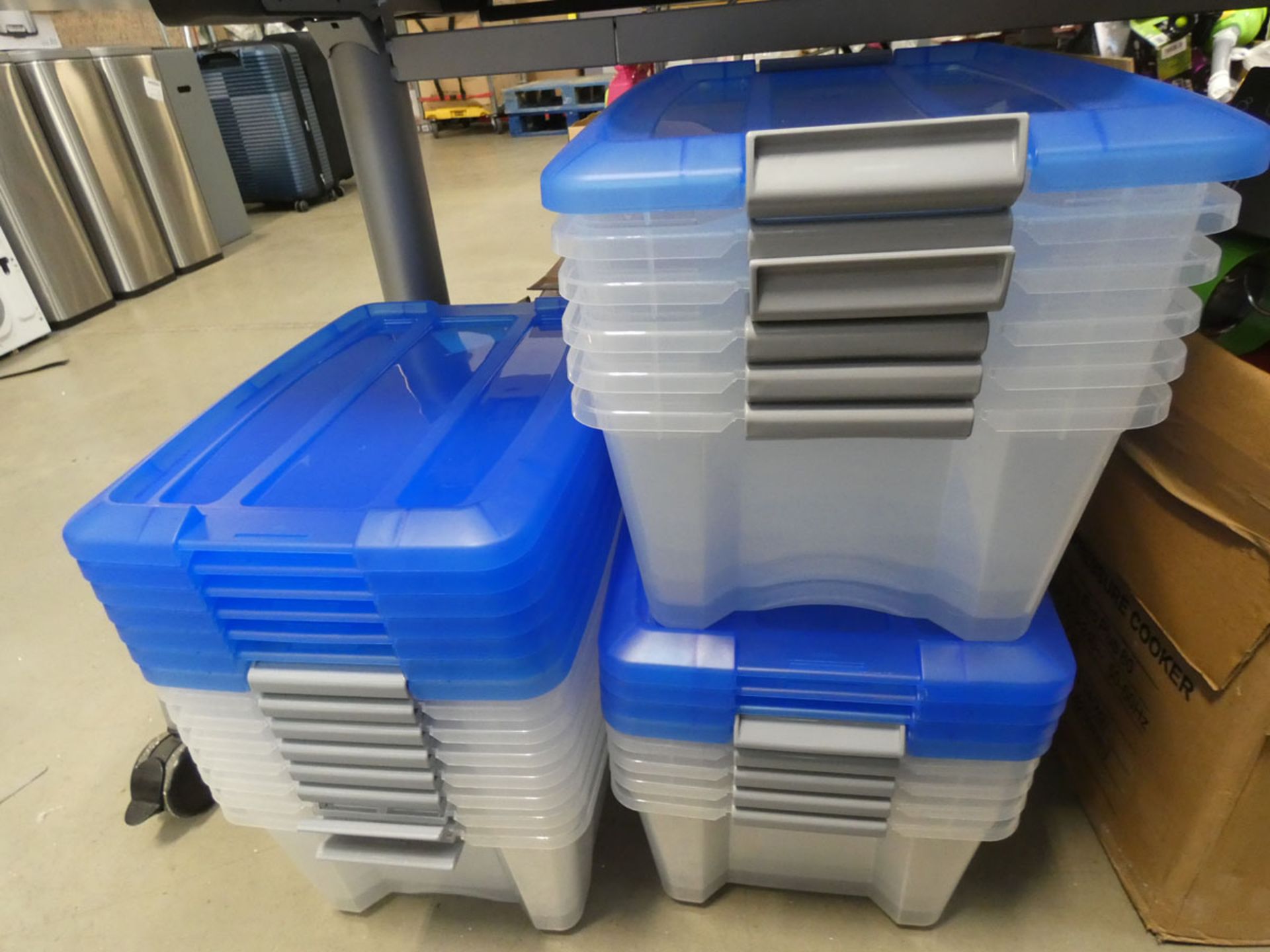3 stacks of small storage boxes