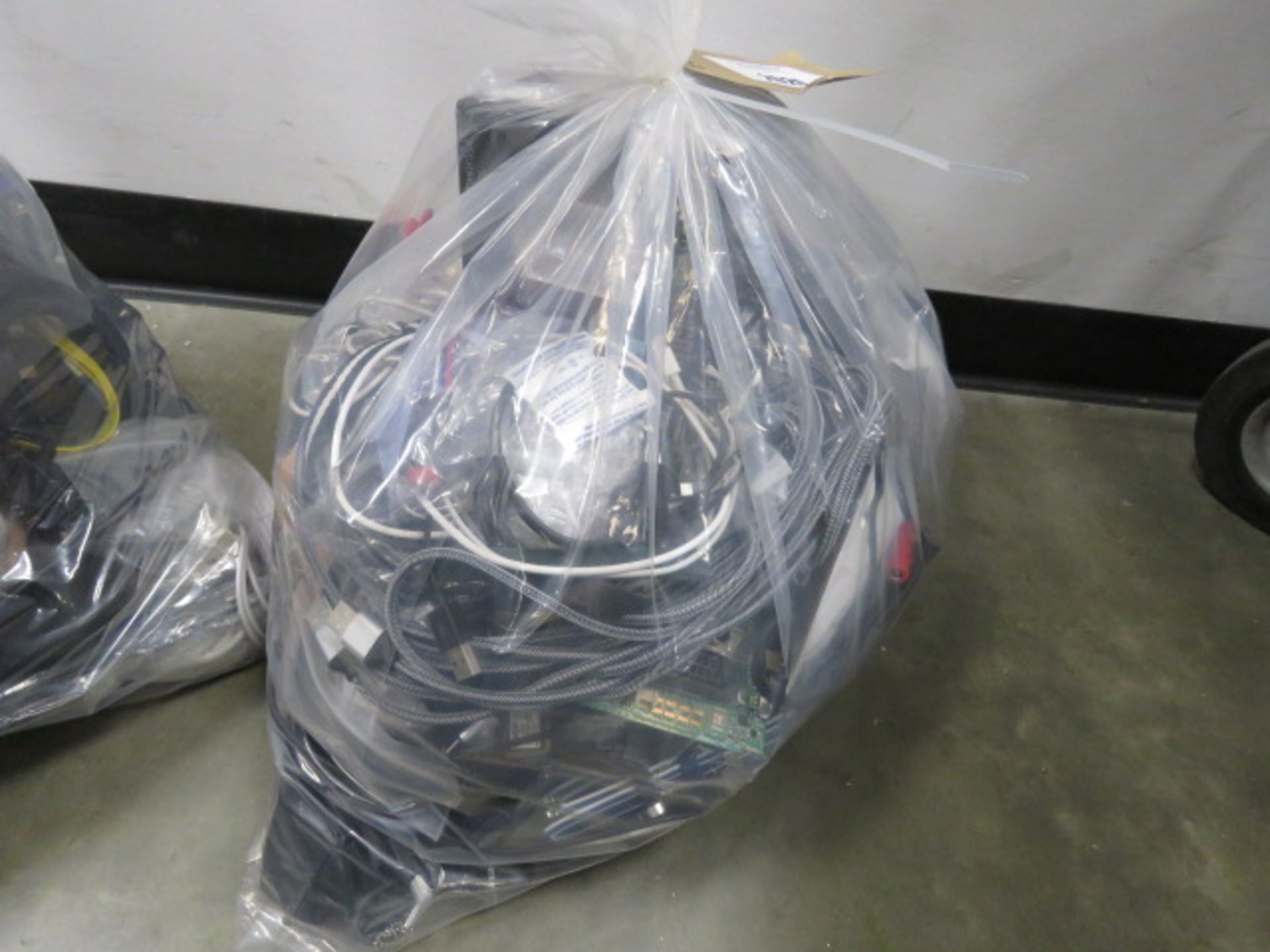 Bag of loose electrical components, cabling and power supplies