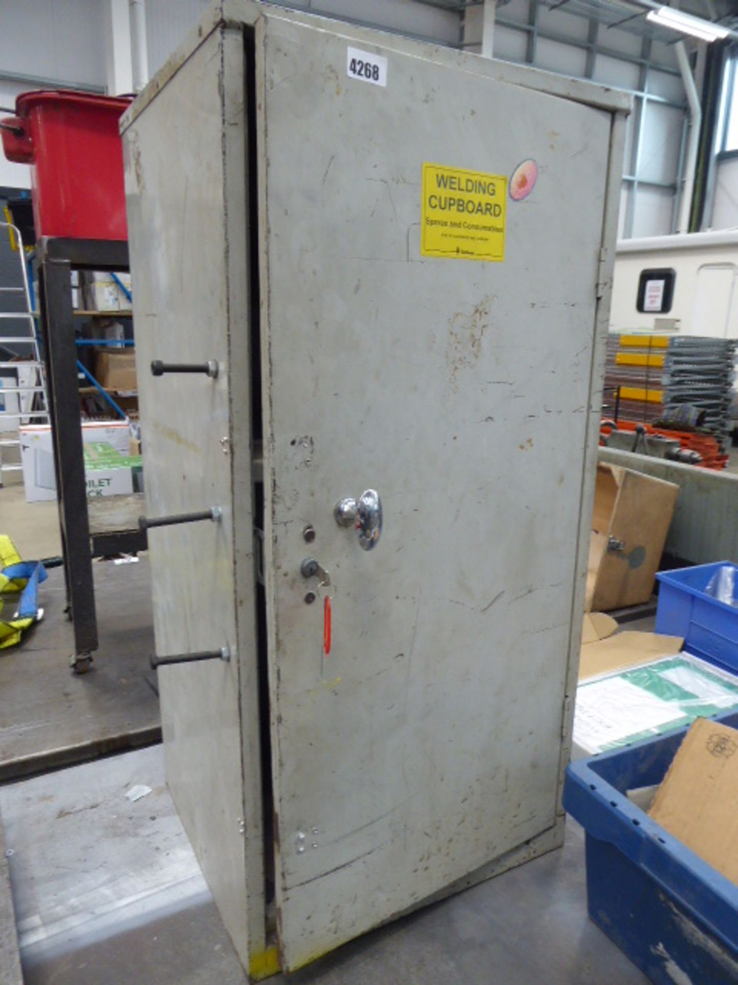 Small metal single door grey cabinet