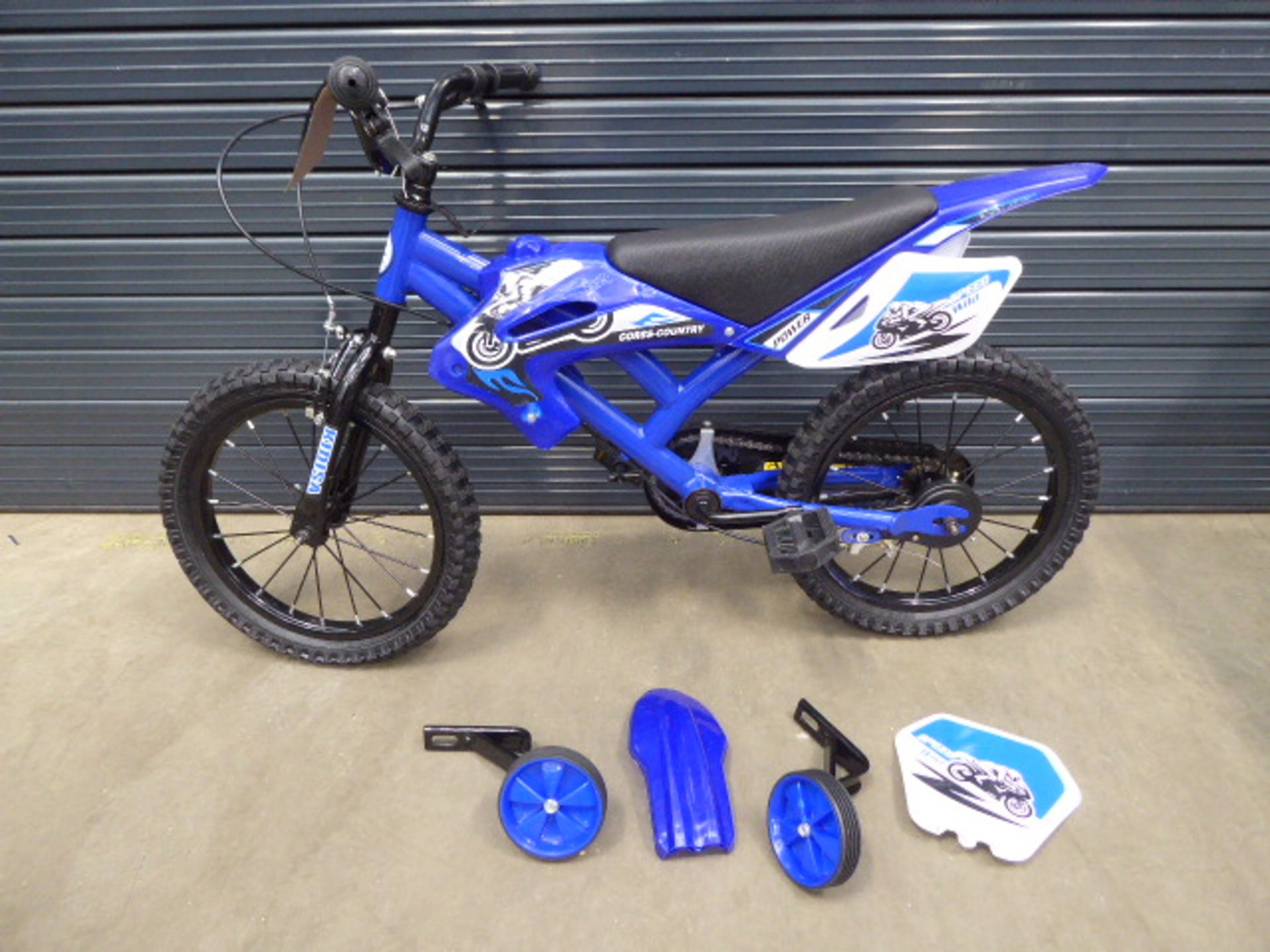 A child's blue motorcycle-style bike