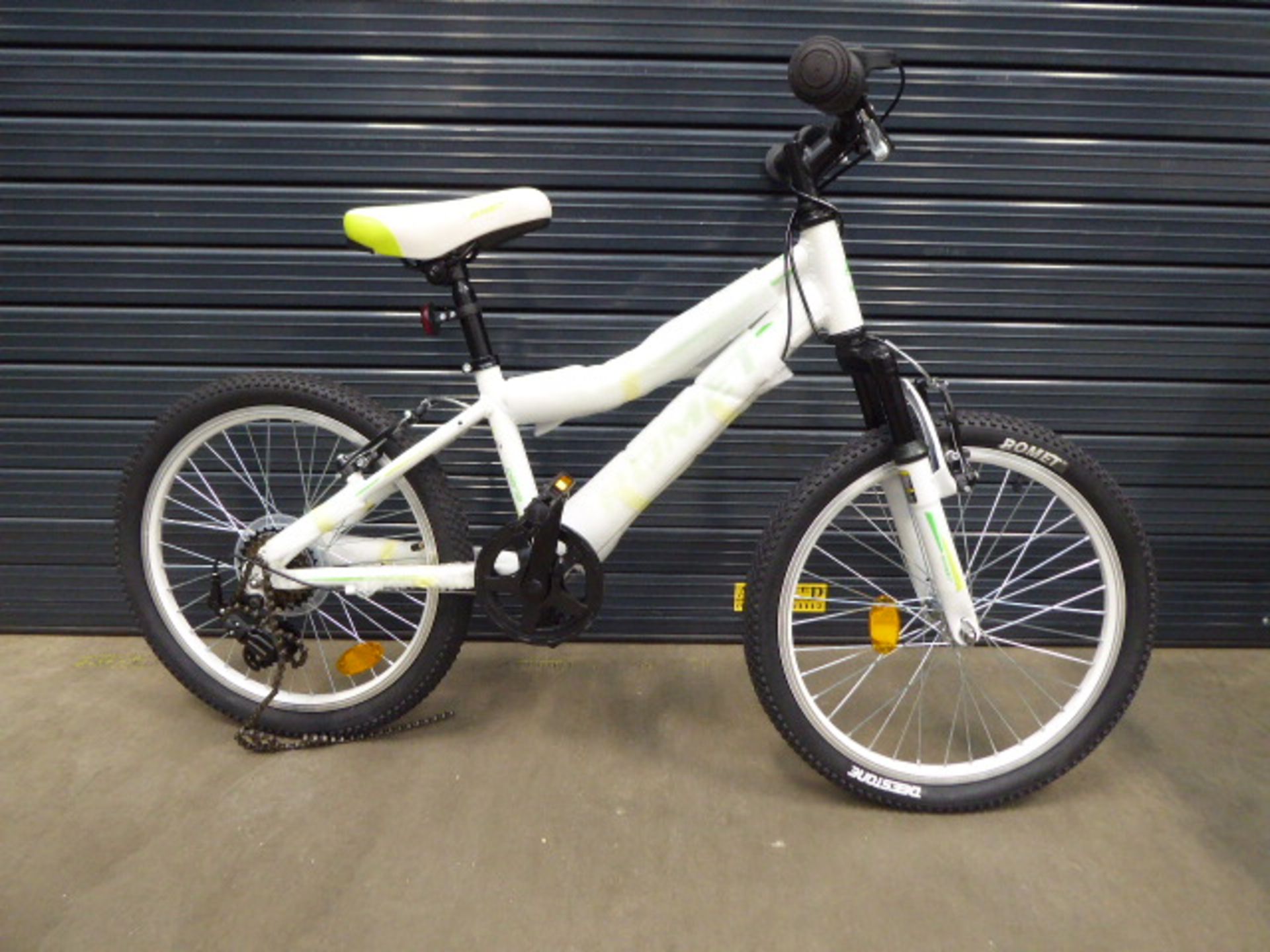 A Romet white small girl's bike