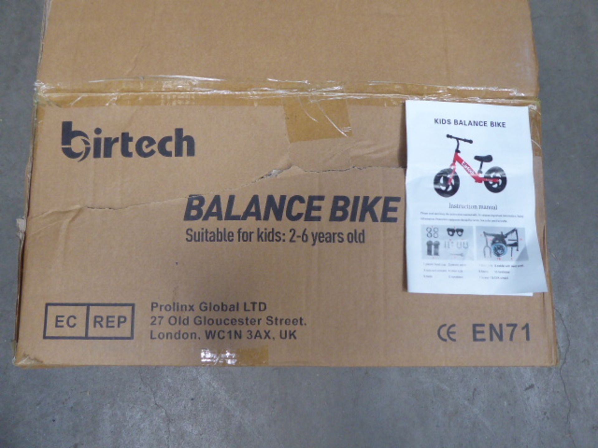 Boxed black childs' balance bike