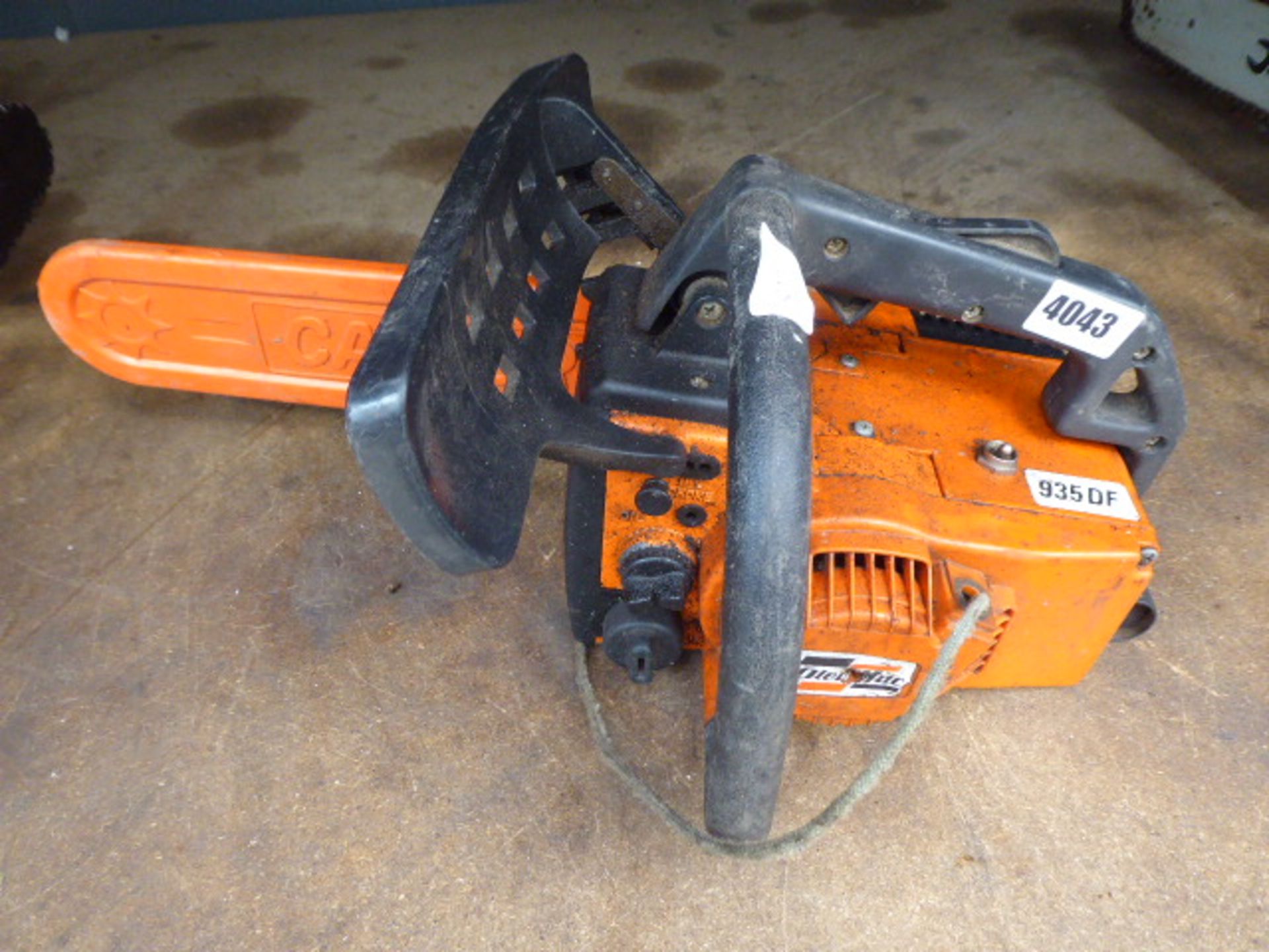 Oleomac orange petrol powered chainsaw