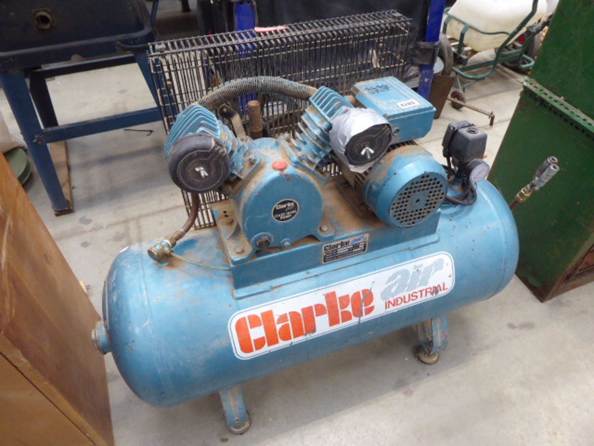 A Clarke Air model SEV110100 receiver mounted air compressor