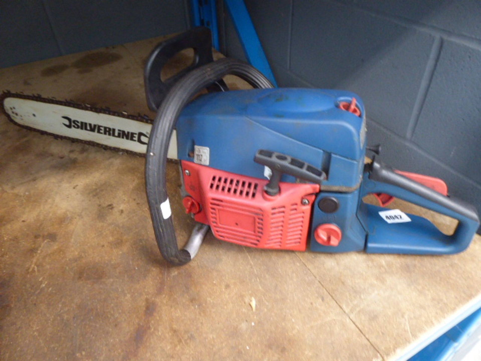 Silverline red and blue petrol powered chainsaw