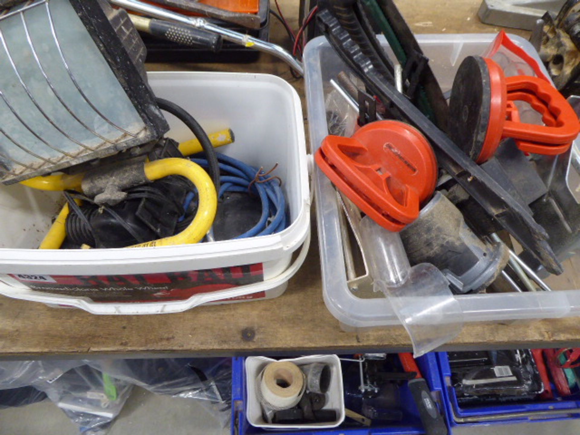 Two plastic boxes containing lead light, mini compressor, pullers and various other tools