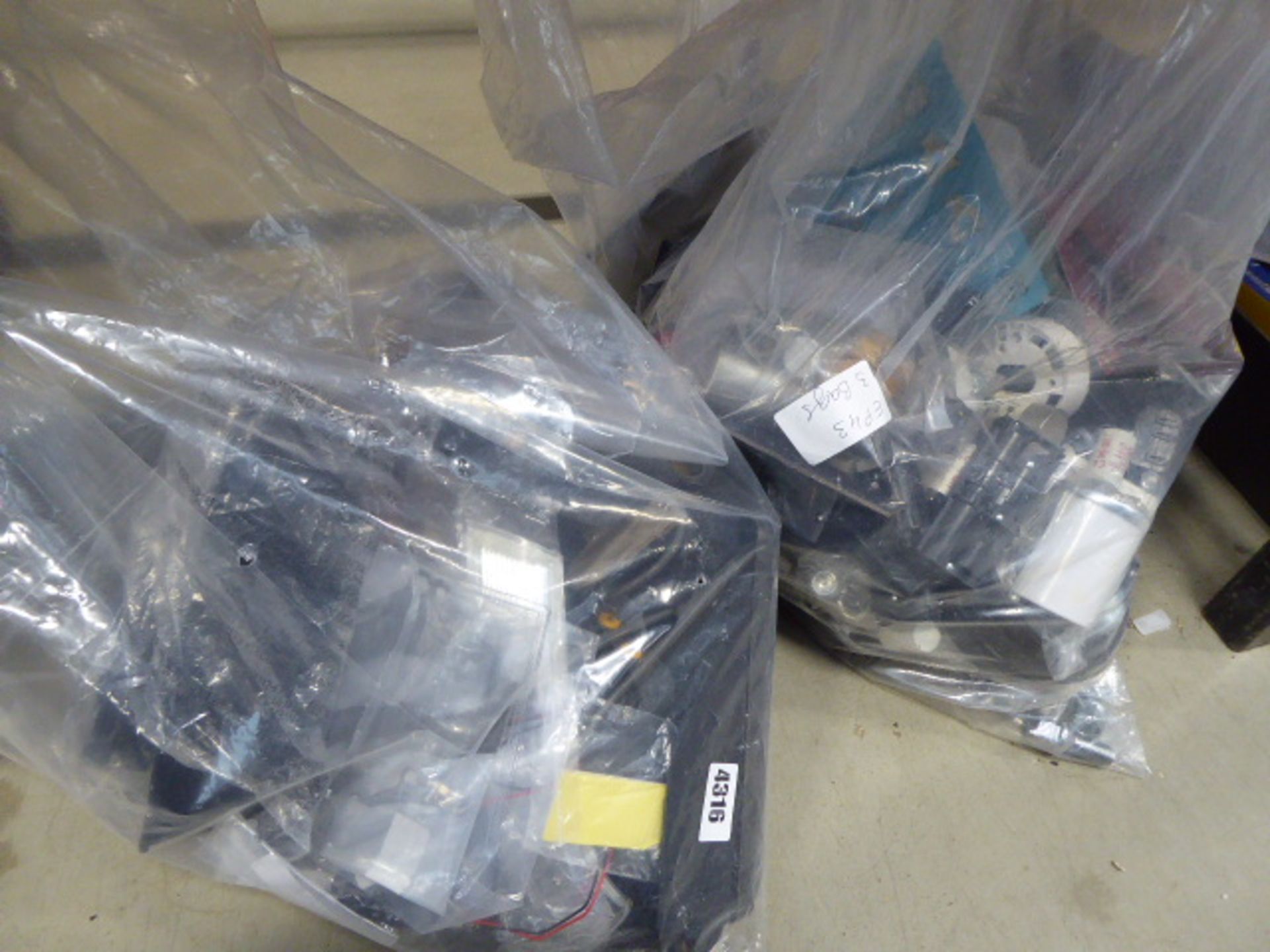 Three bags of various items including large fuses, lights, picture hooks, reflectors, car parts etc