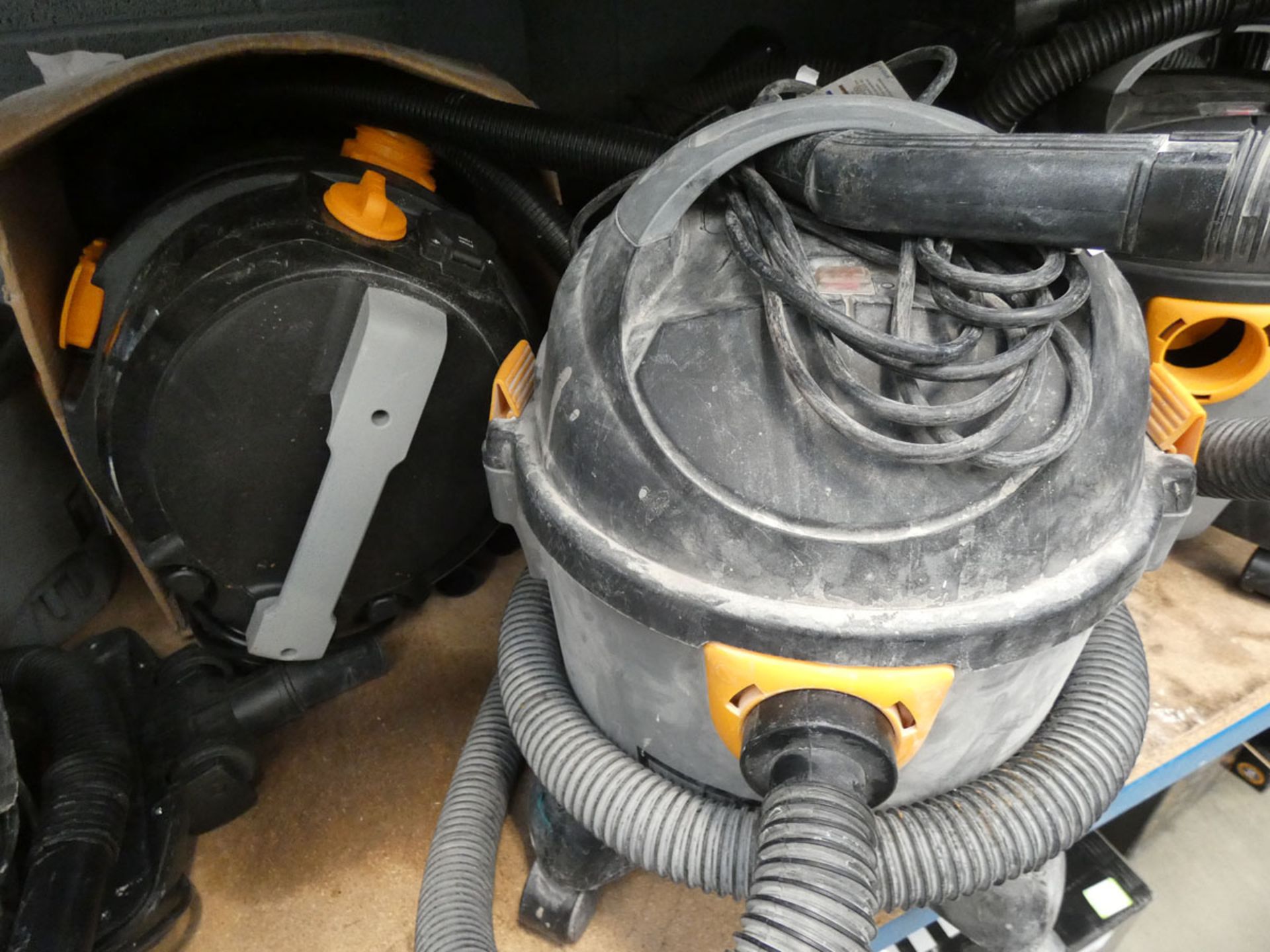 Wet and dry vac and small Titan vac