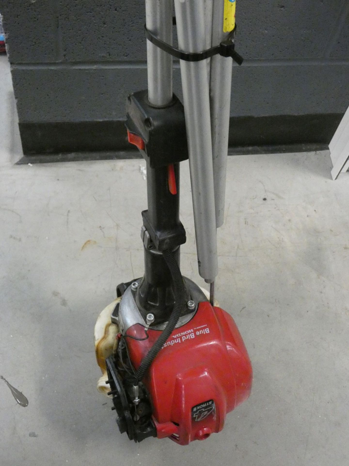 Red Bluebird Honda engine petrol powered multi-tool with strimmer and chainsaw attachment - Image 4 of 4