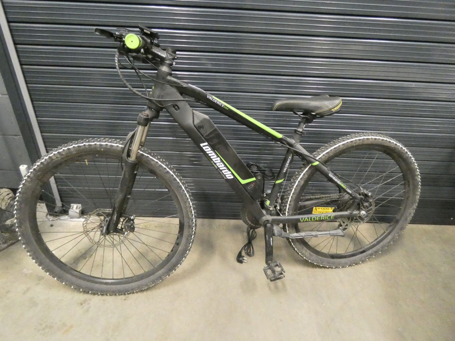 Lombardo Evolution green and black gents electric mountain bike with battery and charger