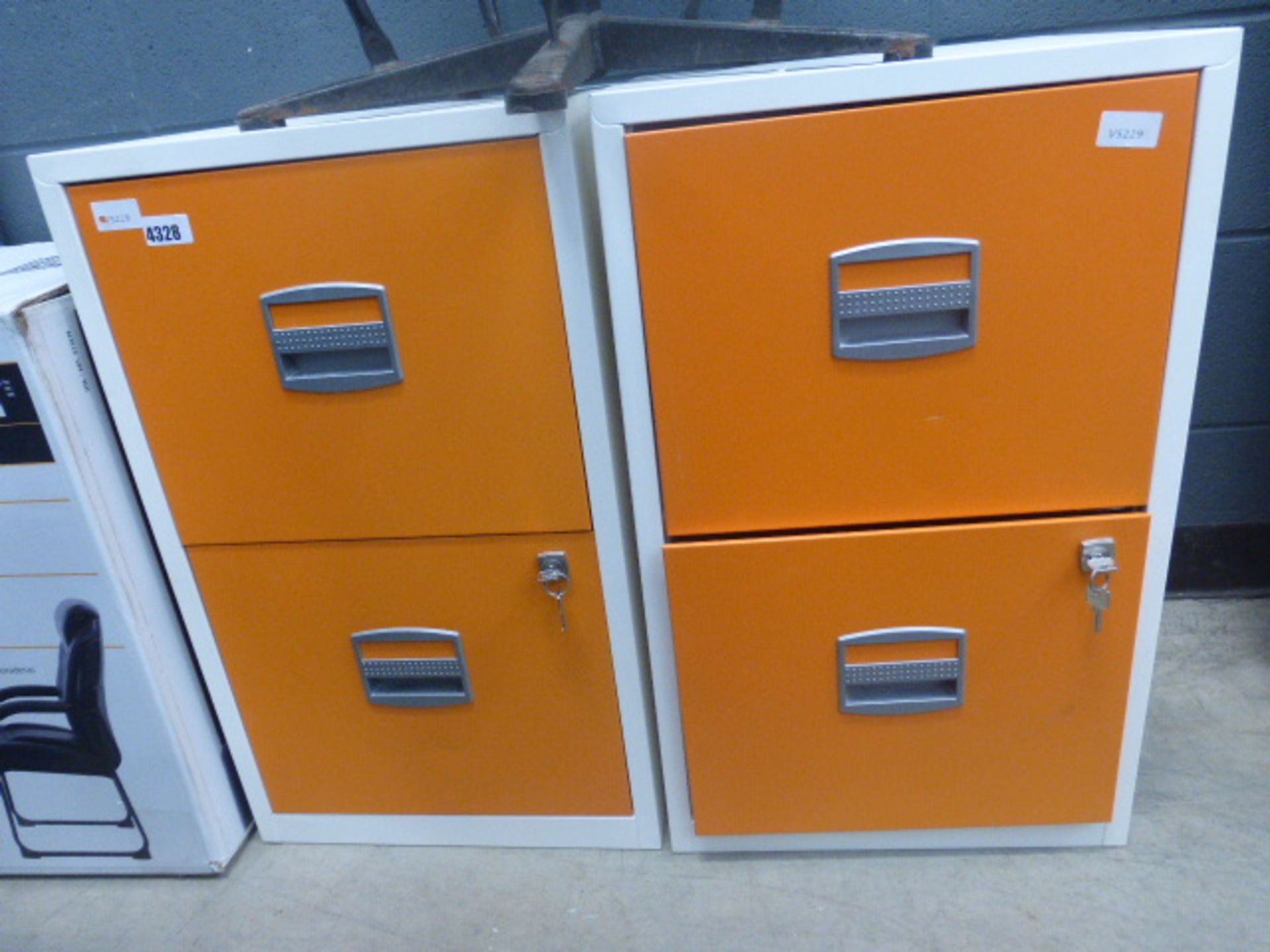 2 orange and white drawer units
