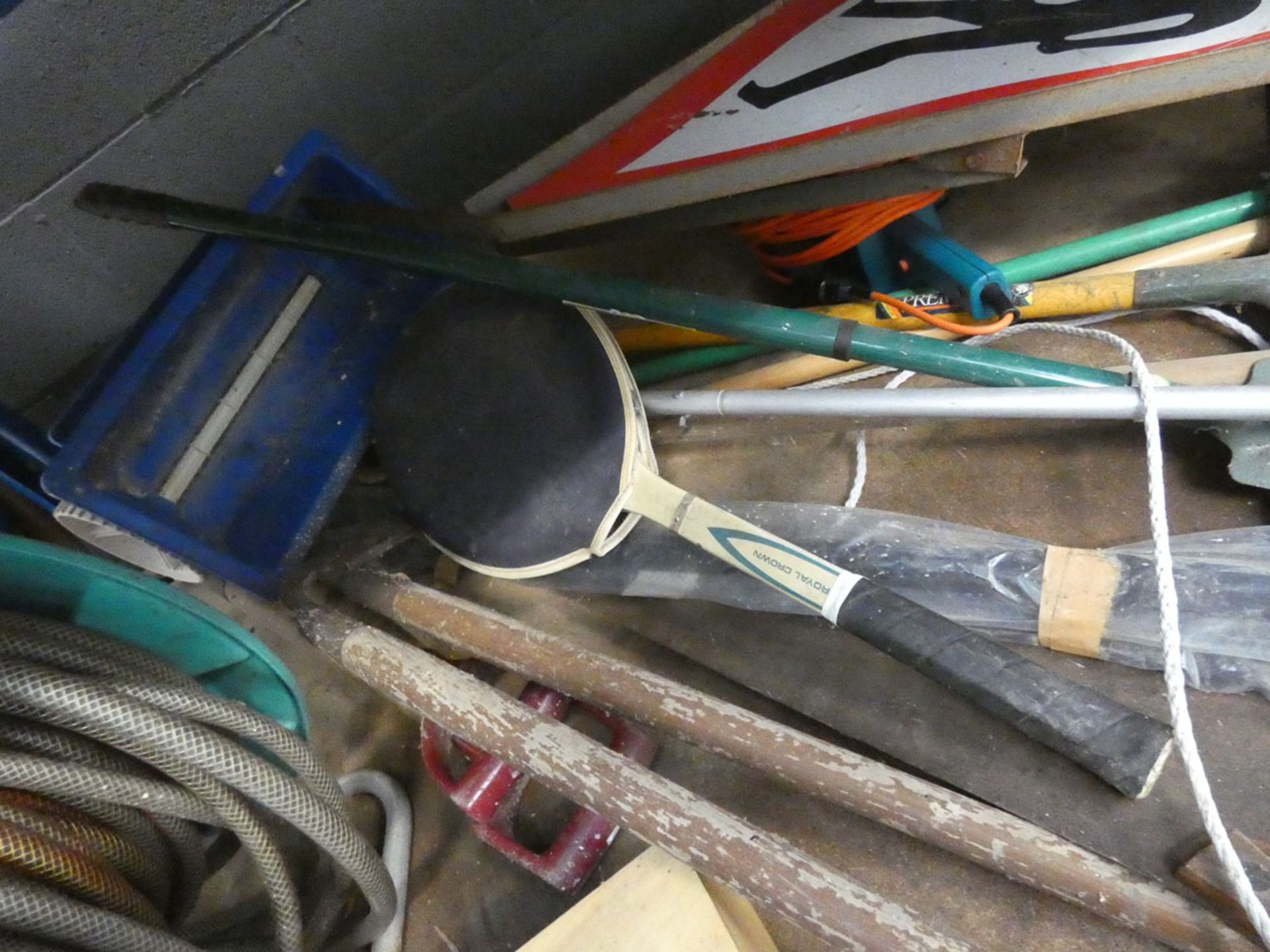 Shelf containing a hose reel and hose, boule set, garden tools, tennis racket, seed spreader and - Image 2 of 7