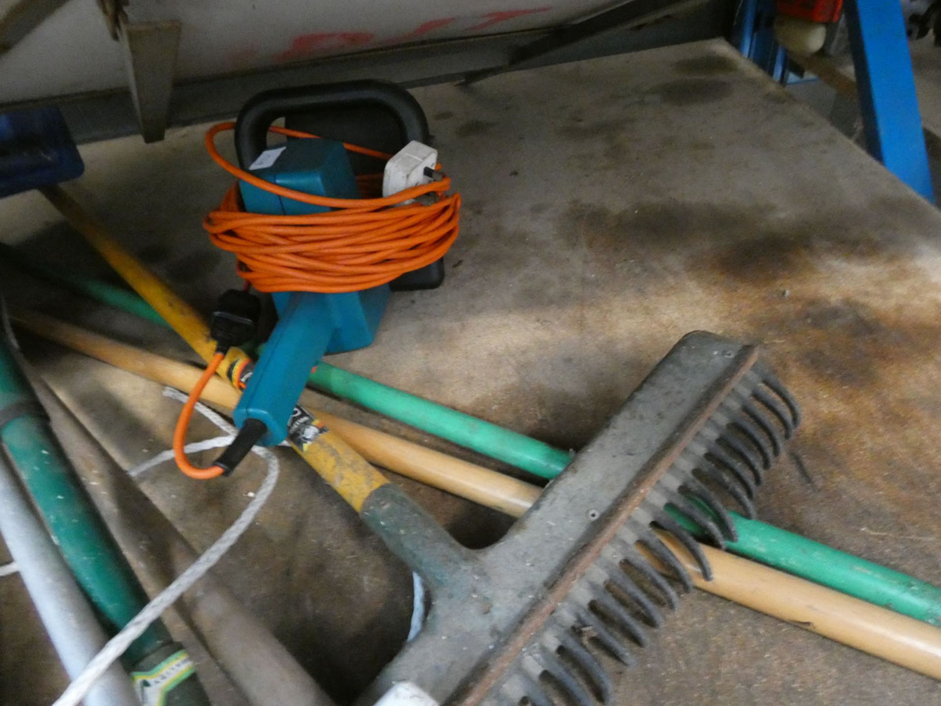 Shelf containing a hose reel and hose, boule set, garden tools, tennis racket, seed spreader and - Image 7 of 7