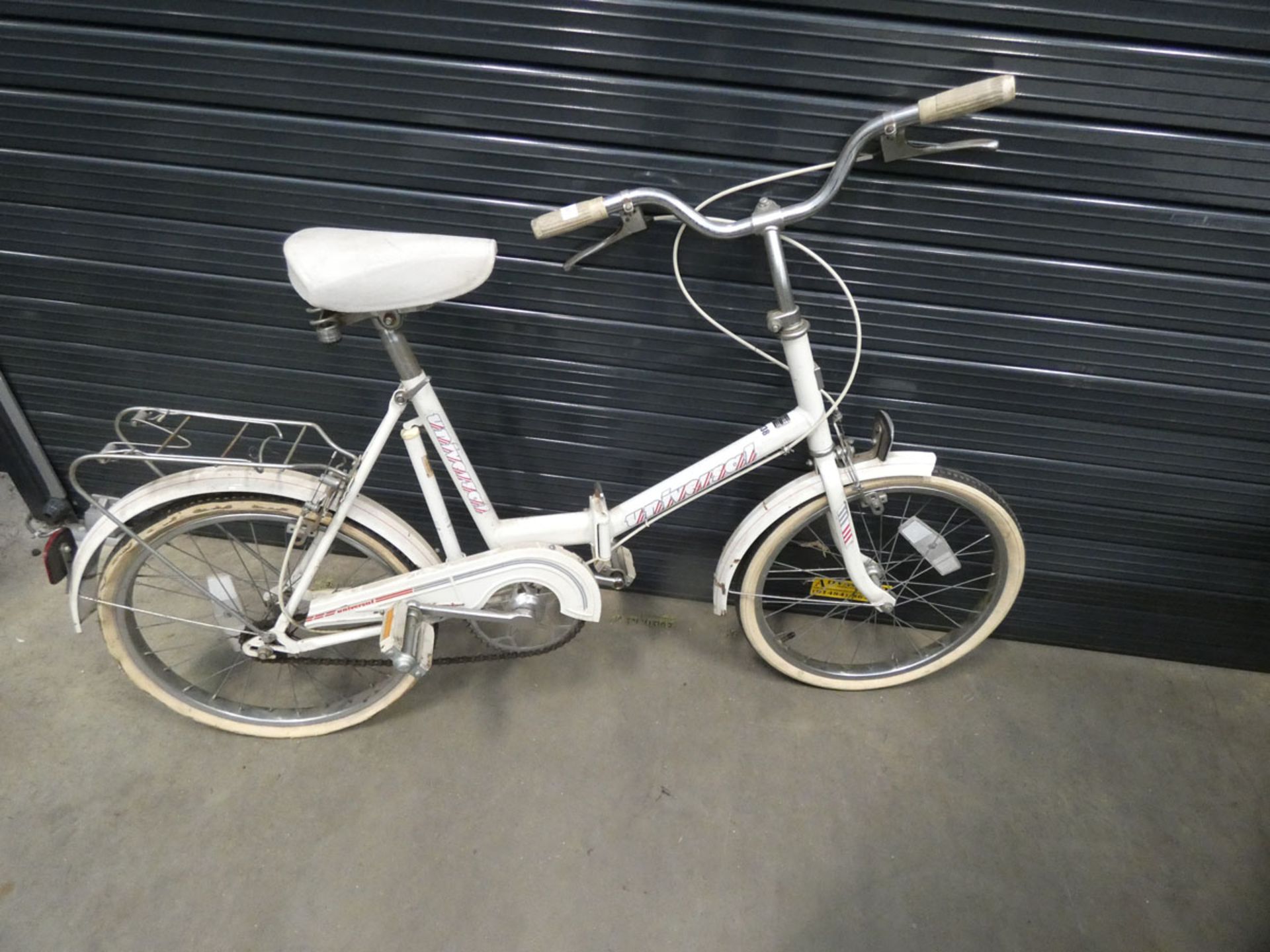 Universal white ladies fold up bike