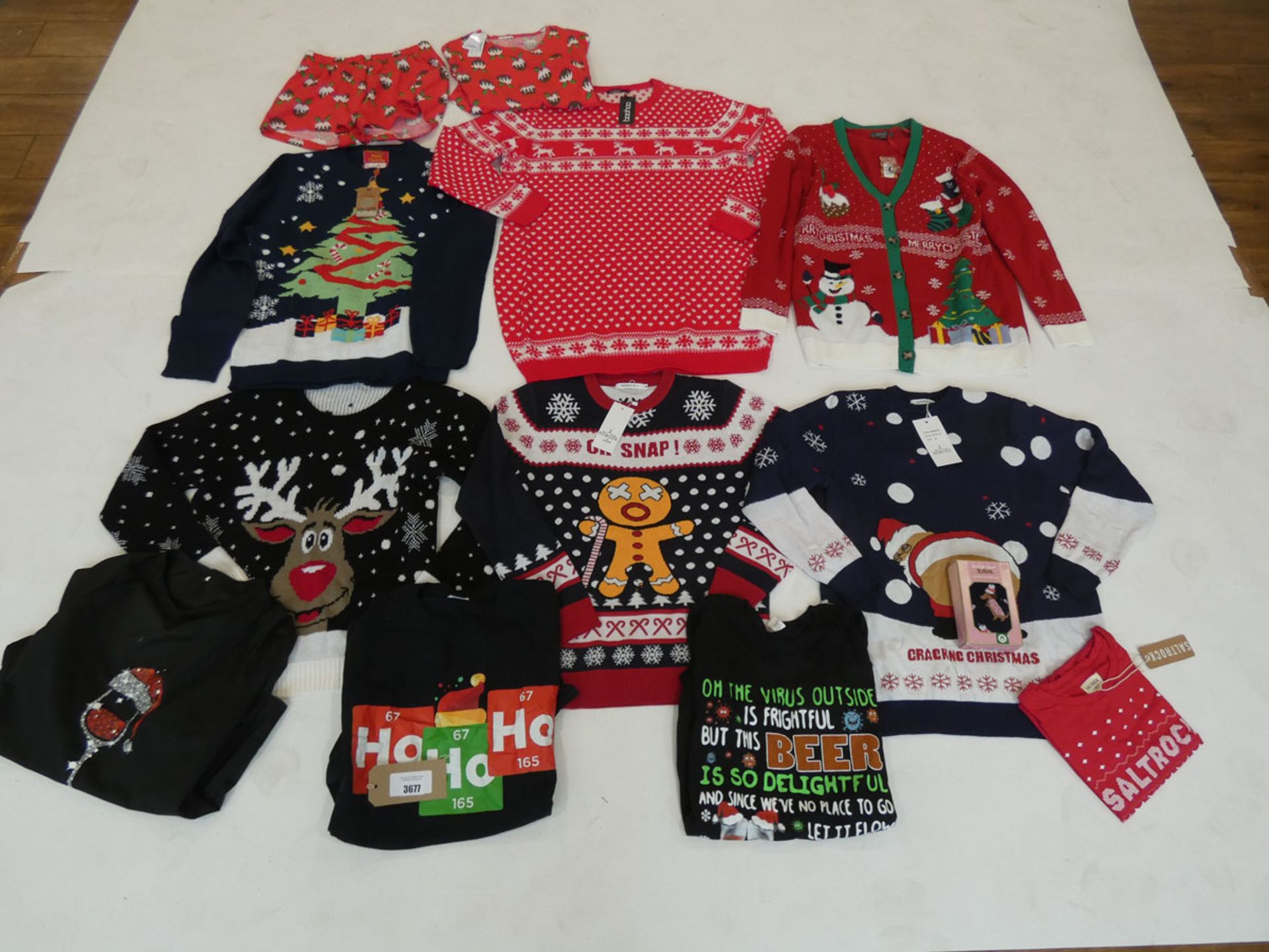 Selection of Christmas clothing to include pyjamas, tops, jumpers & socks in various sizes