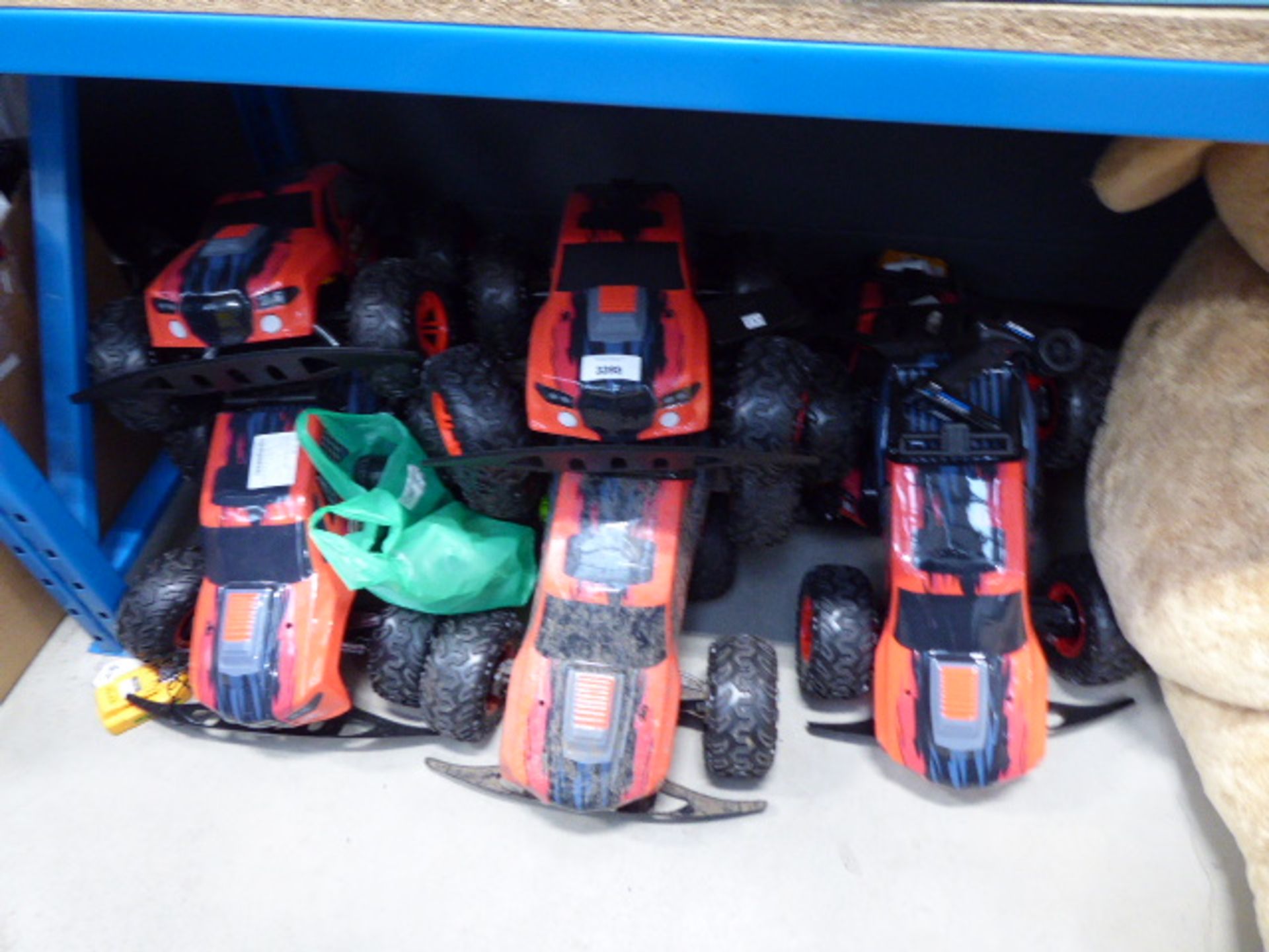 Large quantity of unboxed remote control trucks