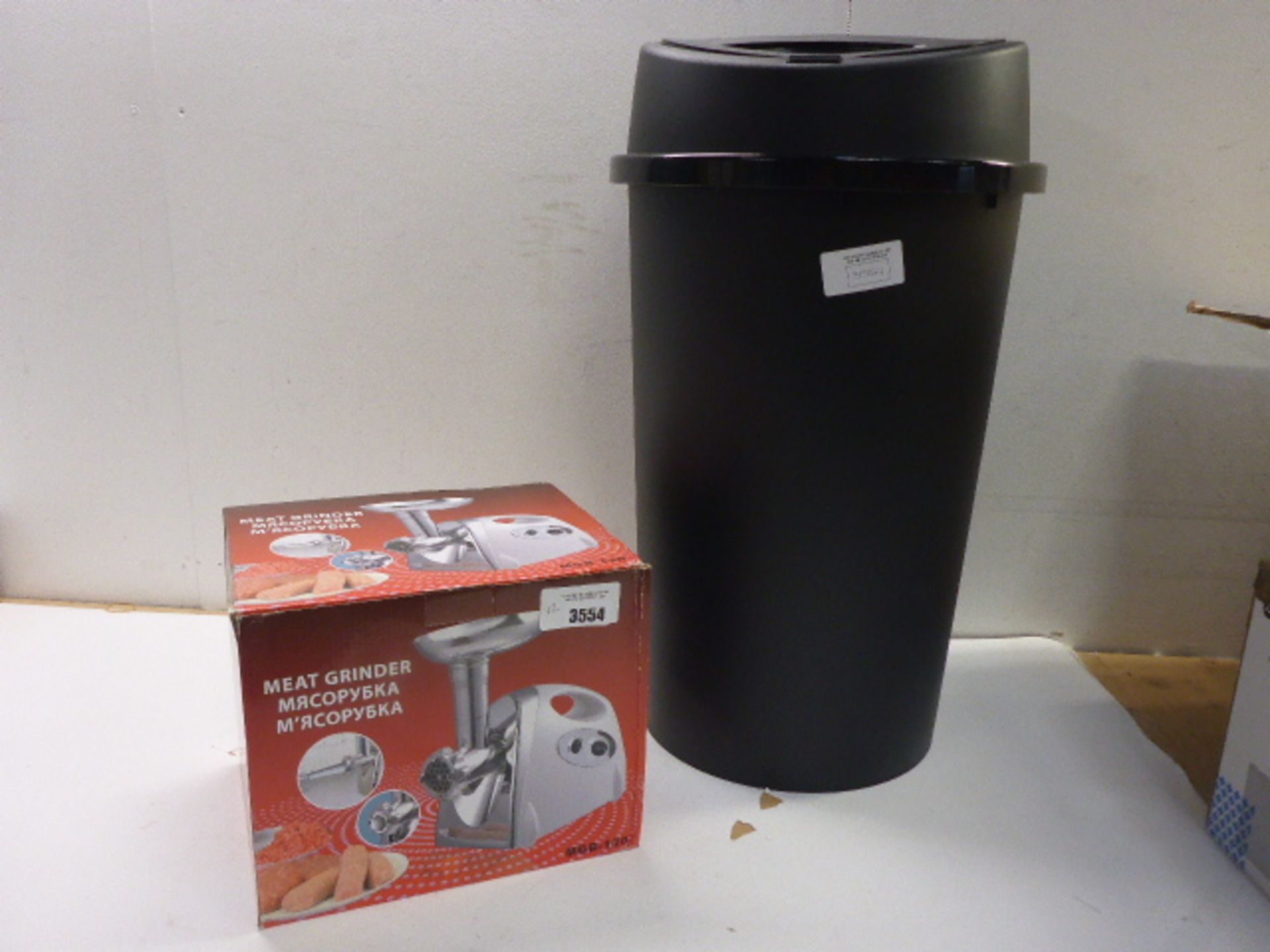 Meat grinder and large plastic bin