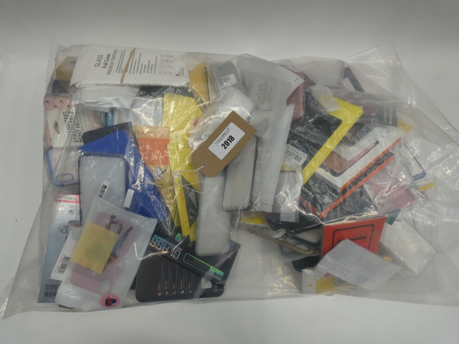 Bag containing quantity of mobile phone cases and covers