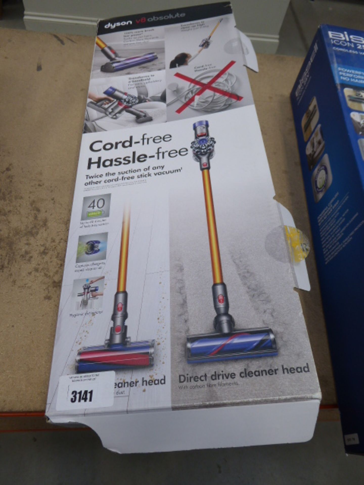Handheld Dyson V8 Absolute with box and accessories to include a pole, charger, 2 heads and