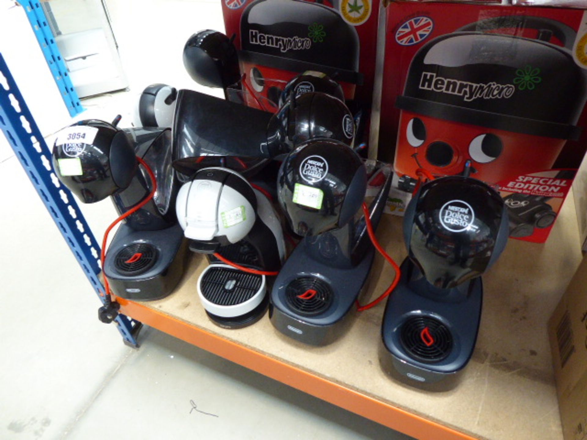 8 unboxed Nescafe Dolce Gusto coffee machines (some complete, some incomplete)
