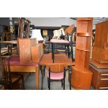 1950s draw leaf table on black painted legs together with a set of 4 matching dining chairs In