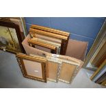 Box containing a quantity of modern gold coloured picture frames