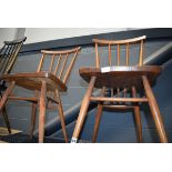 Pair of stick back Ercol style dining chairs Wear to one seat, otherwise good