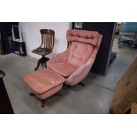 Parker Knoll wing armchair on a swivel base and a matching footstool, both in pale pink buttoned