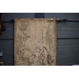 Tapestry wall hanging depicting a couple and their children in a romantic landscape Faded and with