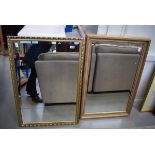 2 rectangular bevelled mirrors in gilt painted frames