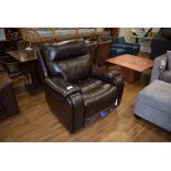 A Gilman Creek electrically operated reclining chair in brown leather finish Working order unknown