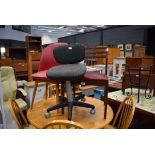 1950's red vinyl kitchen chair, a 1980's dining chair and a grey fabric swivel office chair All in