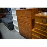 Late 20th century teak finish chest of 2 short and 4 long graduated drawers