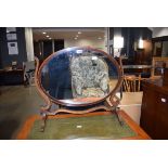 Edwardian mahogany strung and inlaid oval dressing table mirror with similar shield shaped mirror In