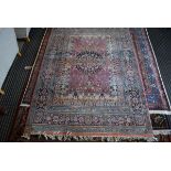 (3) Numad carpet in pink ground and foliate decoration, approx 155 x 230cm