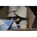 Box containing table lamps and shades