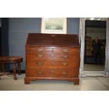 19th century mahogany bureau with fall front above 5 graduated drawers on shaped bracket feet