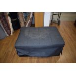 Dark grey fabric ottoman/stowaway bed Stained and damaged