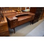 Mid 20th century rosewood finish sideboard/dressing table of 5 drawers on tapered legs In need of