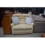 Beige floral 2 seater sofa