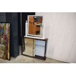 White framed dressing table mirror and a glazed mirrored bathroom cabinet