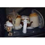 Cage containing a Lladro-style figure, Hummel figure, plus kitchen storage vessels and stoneware